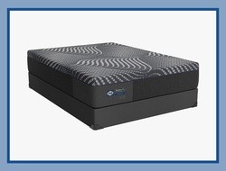 Posturepedic Plus mattress on a flat foundation with a blue border