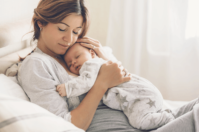 woman holding a baby